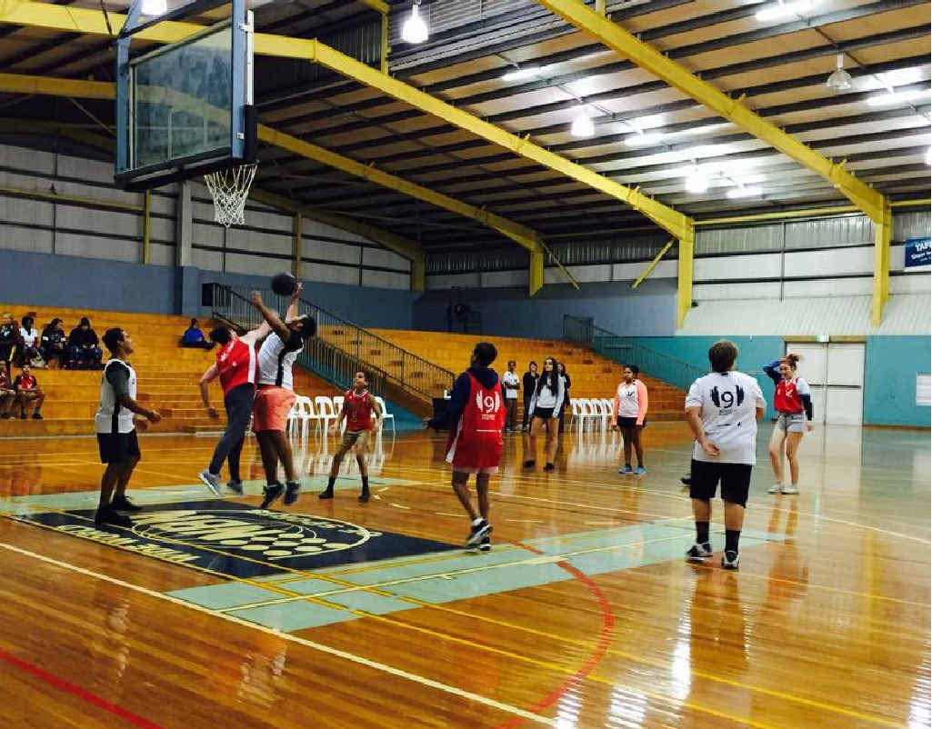 SCORE: Midnight Basketball teams test their skills in the first game of the night. Photo: Isabelle Pilgrim SCORE: Midnight Basketball teams test their skills in the first game of the night. Photo: Isabelle Pilgrim